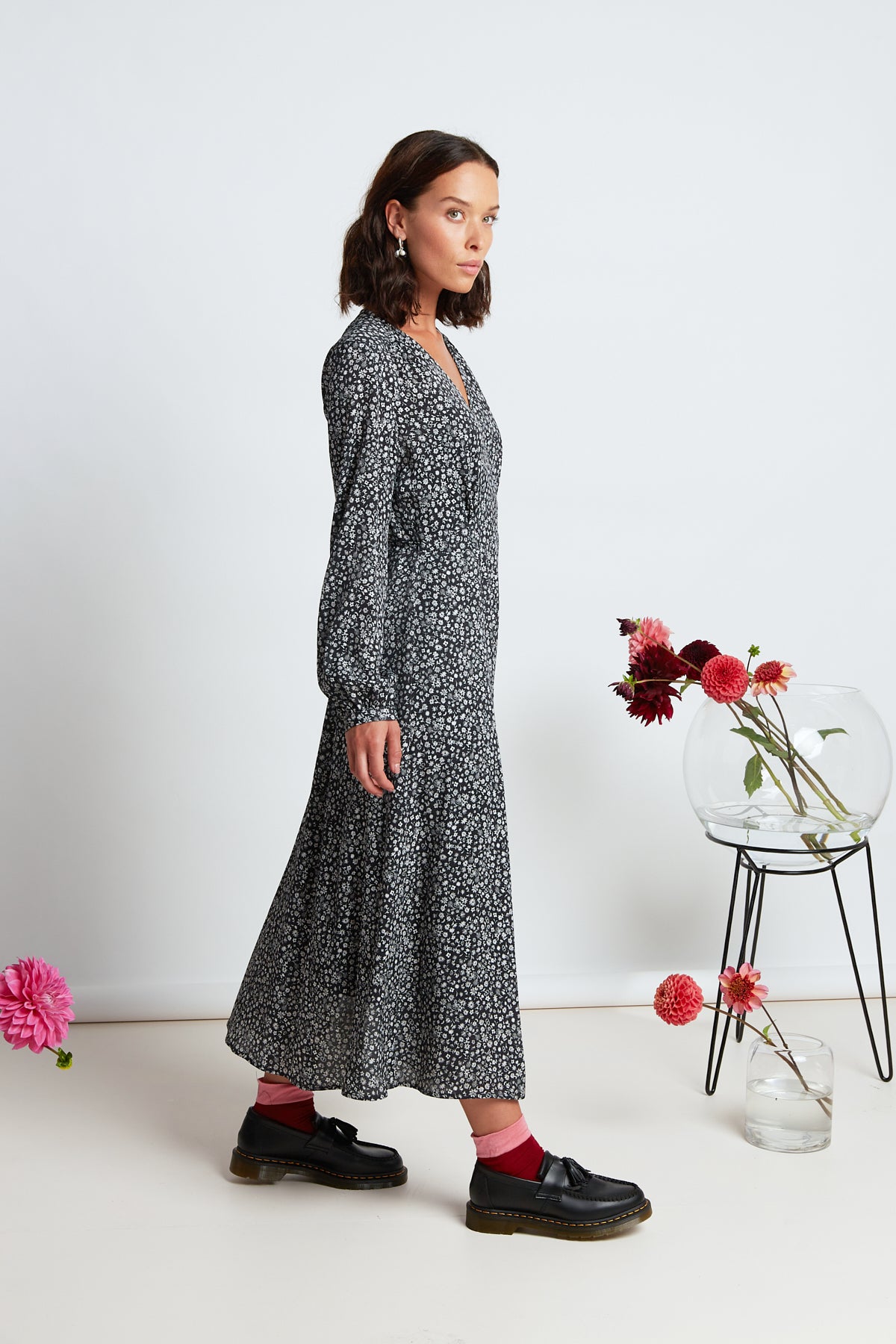 Chloe dress by twenty-seven names. Long-sleeved wrap dress with a high waist and simple, long, flared skirt in black and white micro floral print.