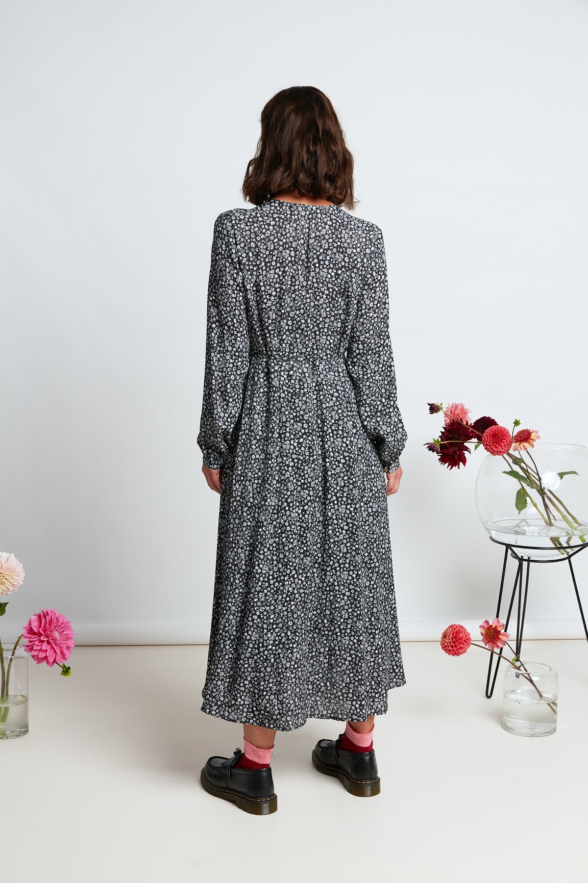 Chloe dress by twenty-seven names. Long-sleeved wrap dress with a high waist and simple, long, flared skirt in black and white micro floral print.