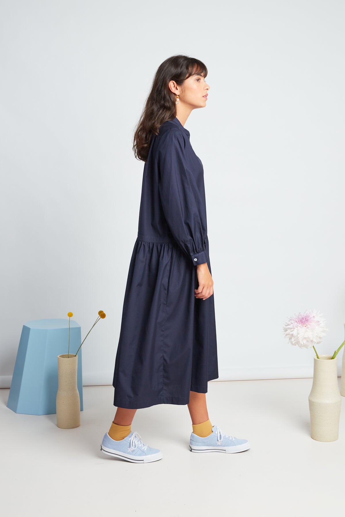 Sade dress by twenty-seven names. A crisp shirt dress in organic cotton, with half placket at the neck, and a dropped waist skirt. Pictured in navy.