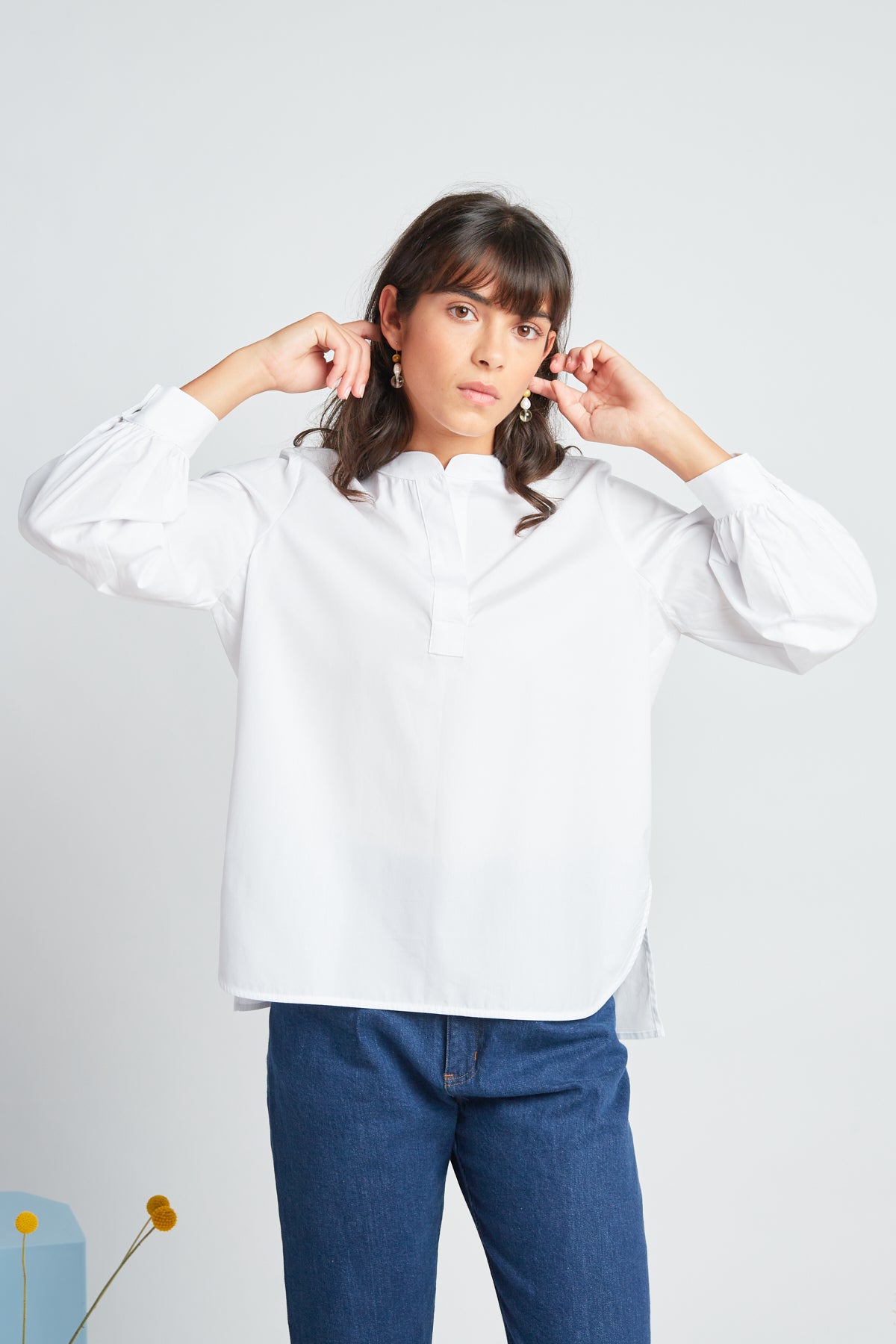 Promised shirt by twenty-seven names. A long-sleeved blouse in crisp organic cotton featuring a half placket at the neck and a dropped back bodice. Pictured in white.