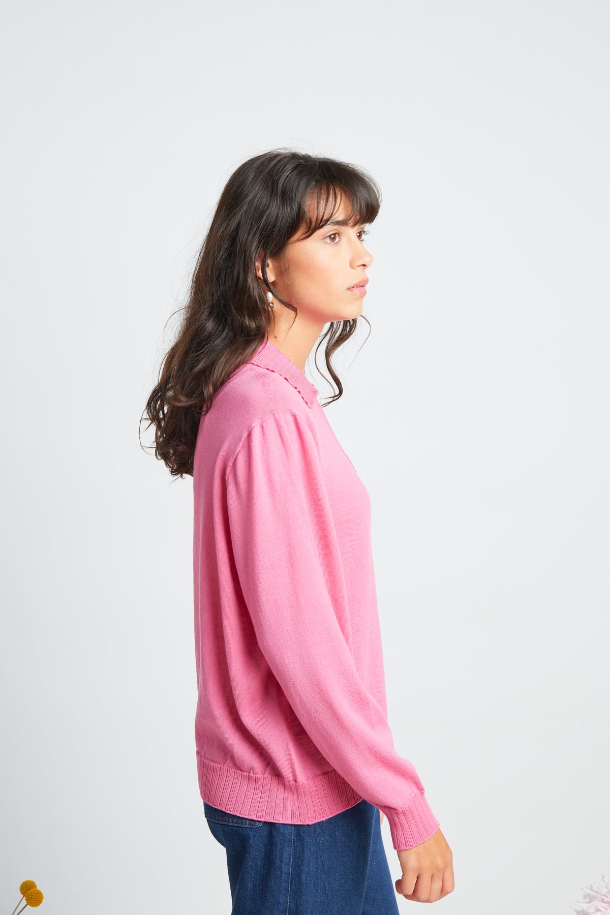 Katie jumper by twenty-seven names. A light-weight 100% merino sweater with a zip at the centre-front and a little collar. Pictured in Candy pink.